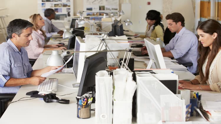 Team working at their office desks