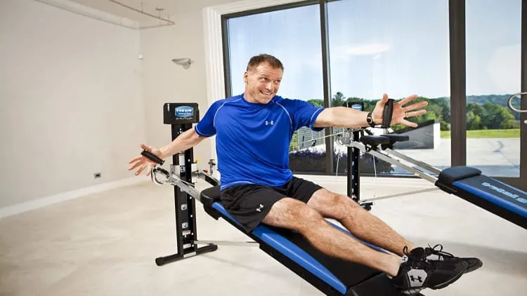 A man working out on the Total Gym