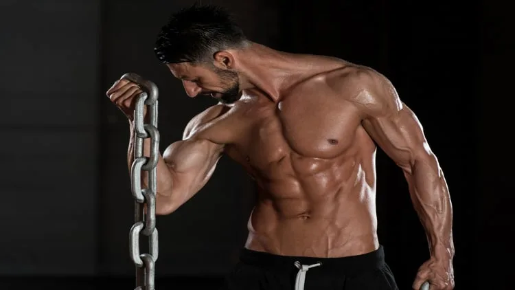 Man doing bicep curls with chains