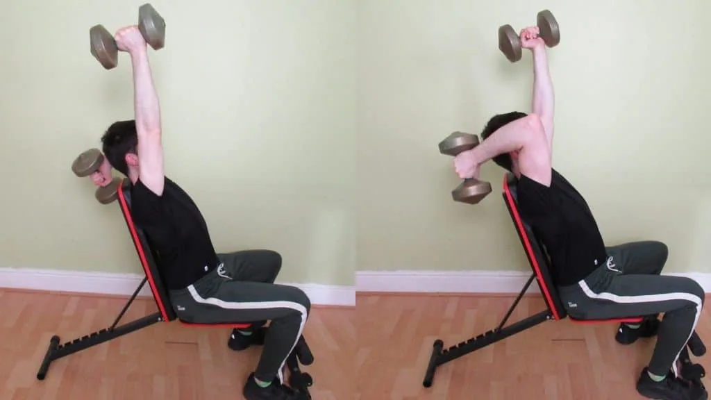 A man doing an alternating seated tricep extension