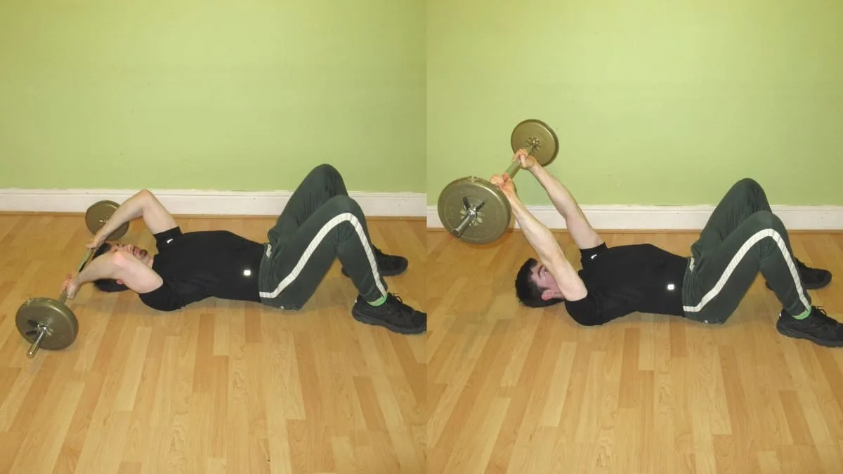 A man performing a deadstop French press for his triceps