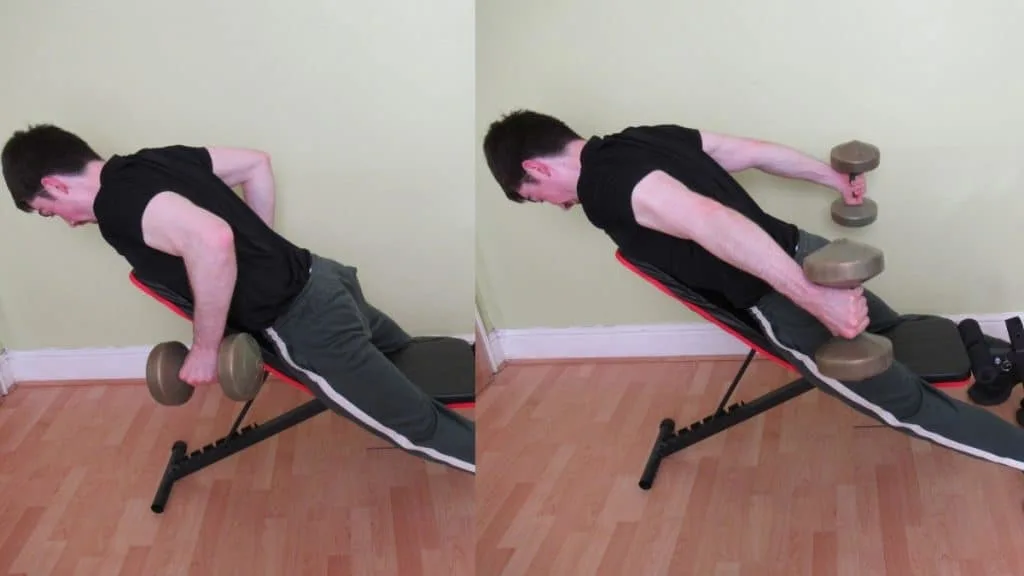 A man doing a bent over tricep extension on a bench