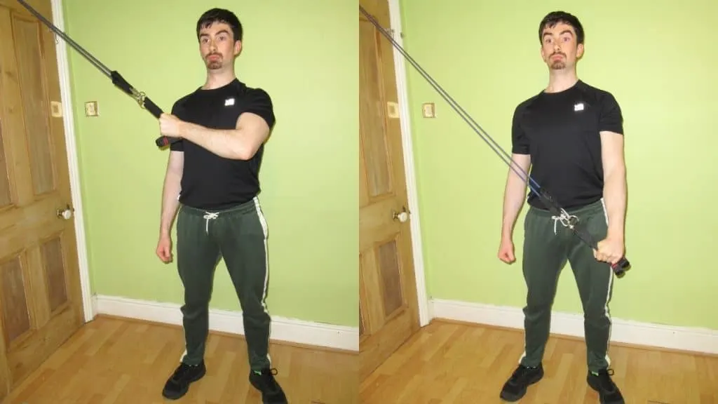 A man performing a cross body resistance band tricep extension