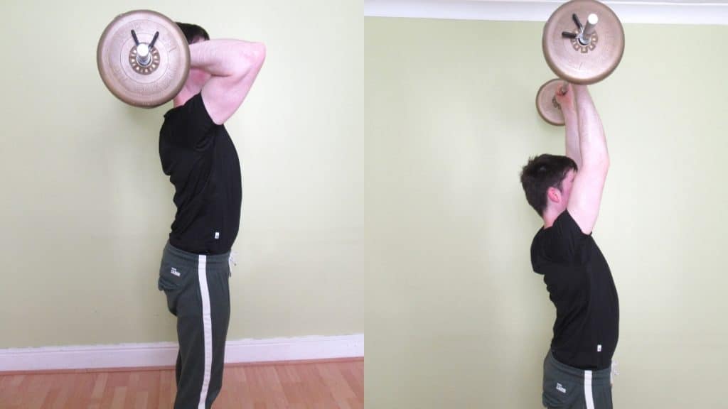 A man doing a standing French press exercise with a barbell