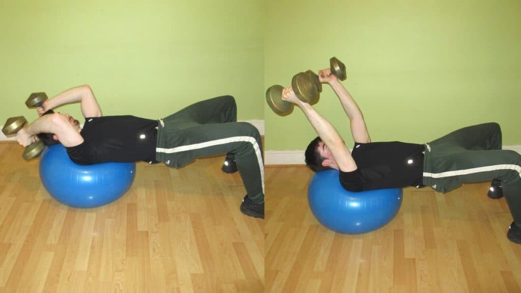 A man doing a French press on a stability ball