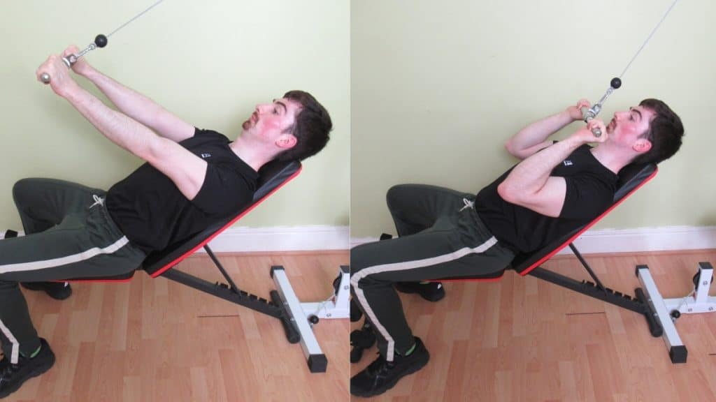 A man performing high incline cable tricep extensions