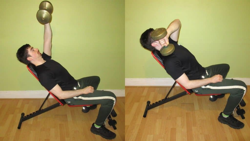 A man doing an incline cross body triceps extension