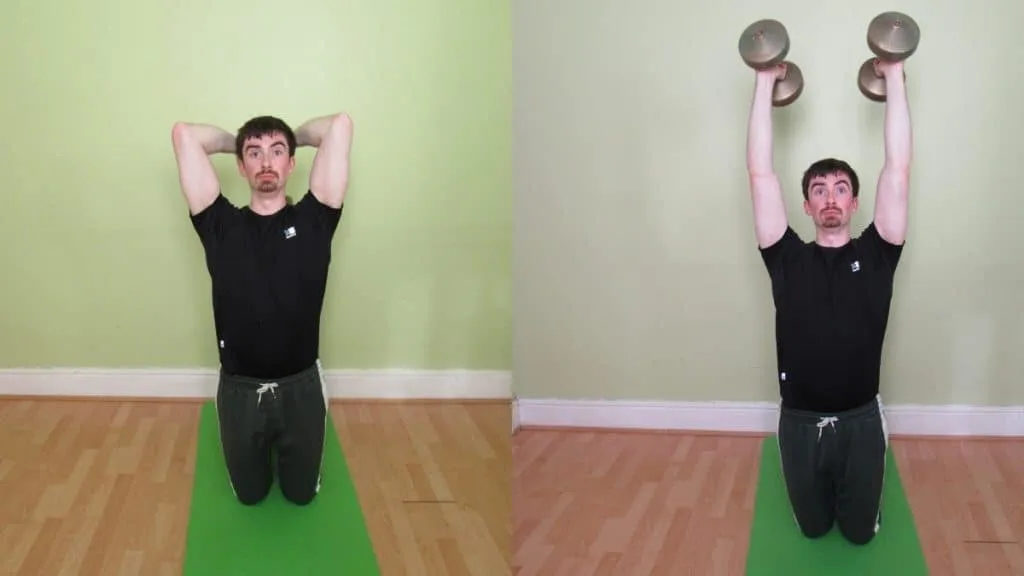 A man performing an overhead kneeling dumbbell tricep extension