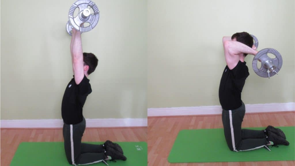 A man doing a kneeling overhead EZ bar tricep extension