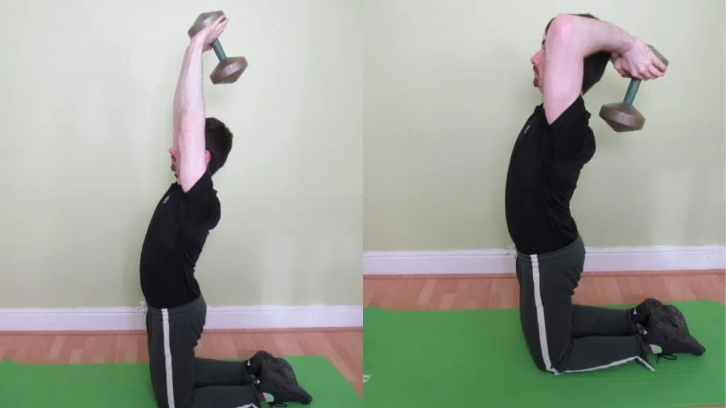 A man doing an overhead kneeling tricep extension with a dumbbell