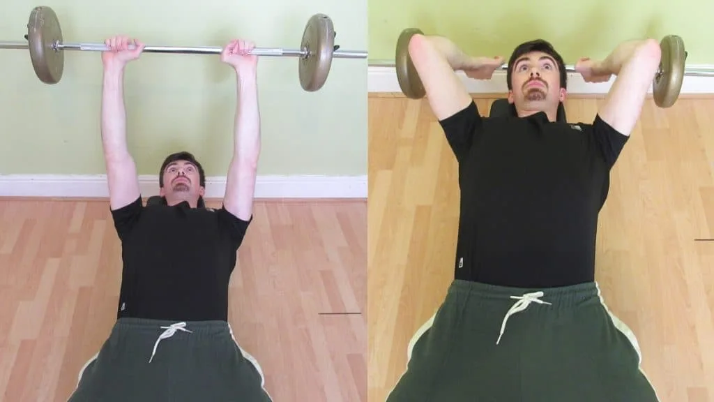 A man doing a lying barbell tricep extension