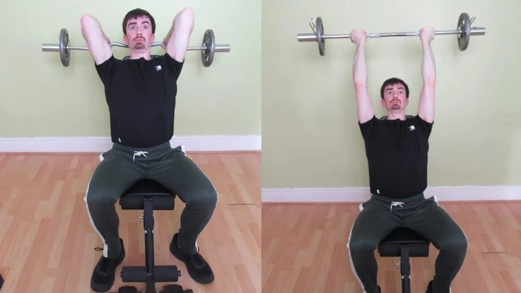 A man doing a reverse seated EZ bar tricep extension