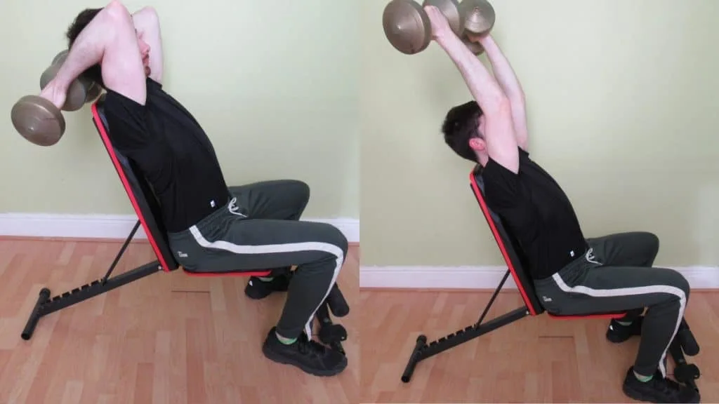 A man performing a seated dumbbell reverse grip tricep extension