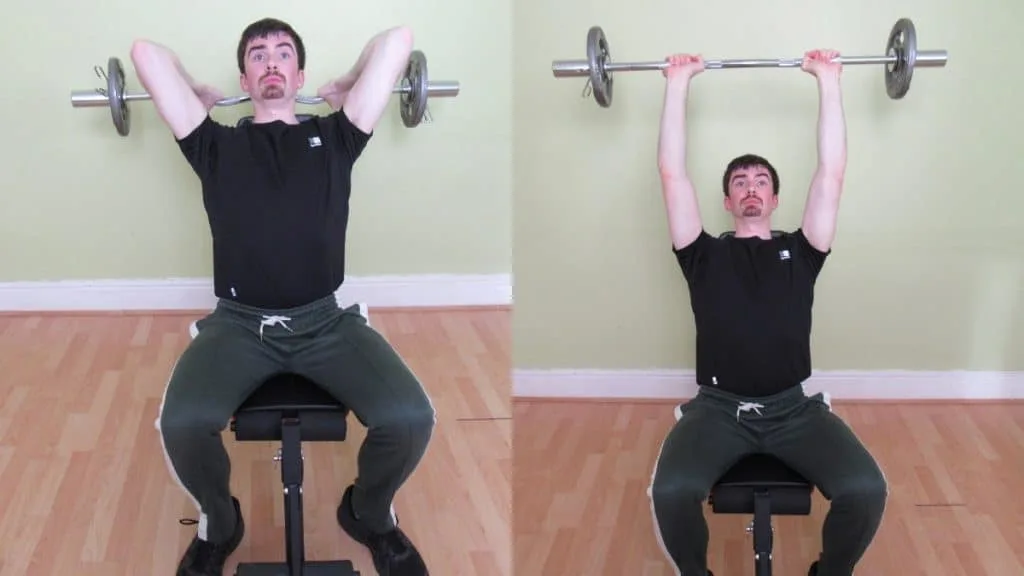 A man doing a seated EZ bar overhead extension