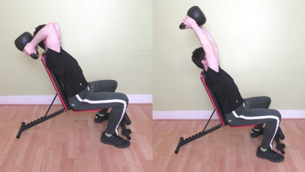 A man performing seated kettlebell triceps extensions