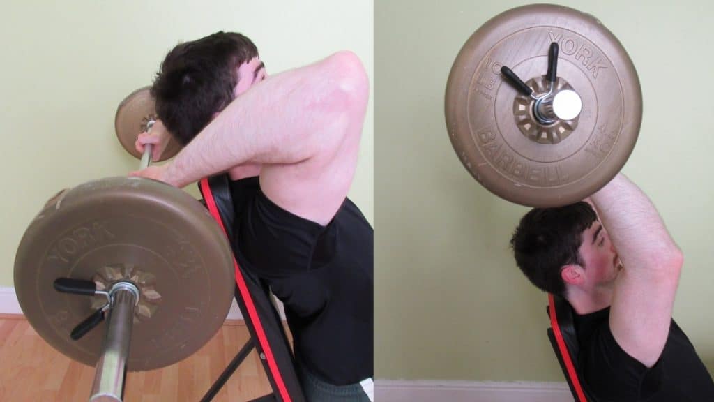 A man doing a seated overhead barbell tricep extension