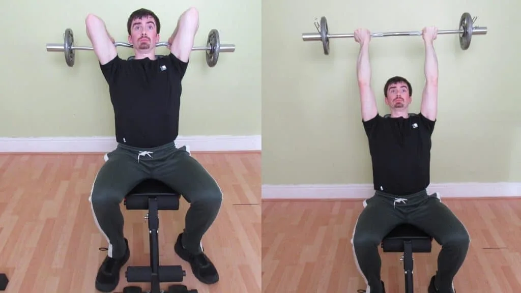 A man doing a seated reverse overhead tricep extension