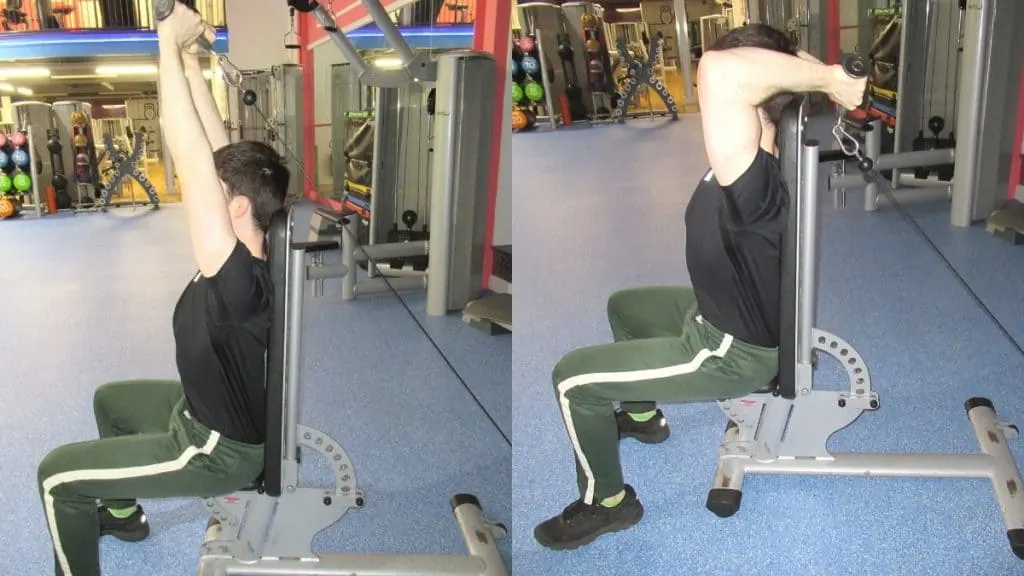 A man doing a seated v bar overhead cable extension