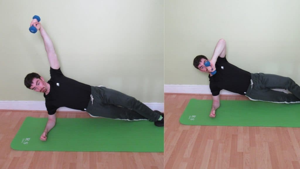 A man doing a side plank with tricep extension