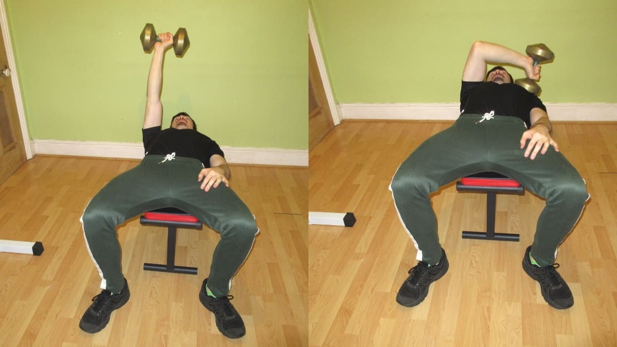 A man doing a single arm cross body tricep extension with a dumbbell
