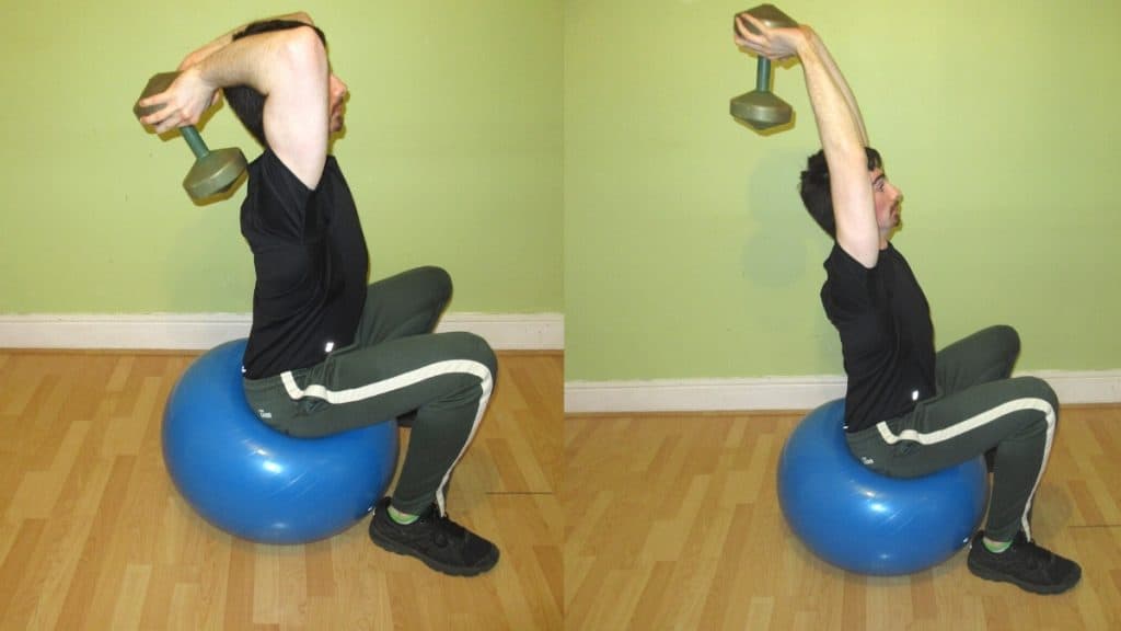 A man doing a stability ball French press with a dumbbell