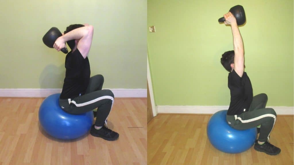 A man doing a stability ball KB French press