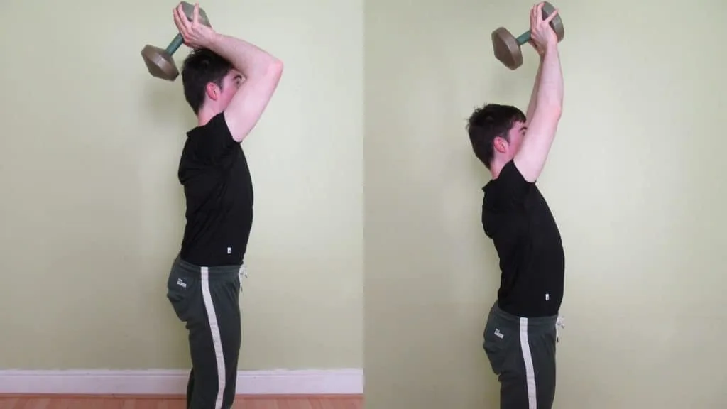 A man making a common standing tricep extension mistake: allowing too much forward elbow movement