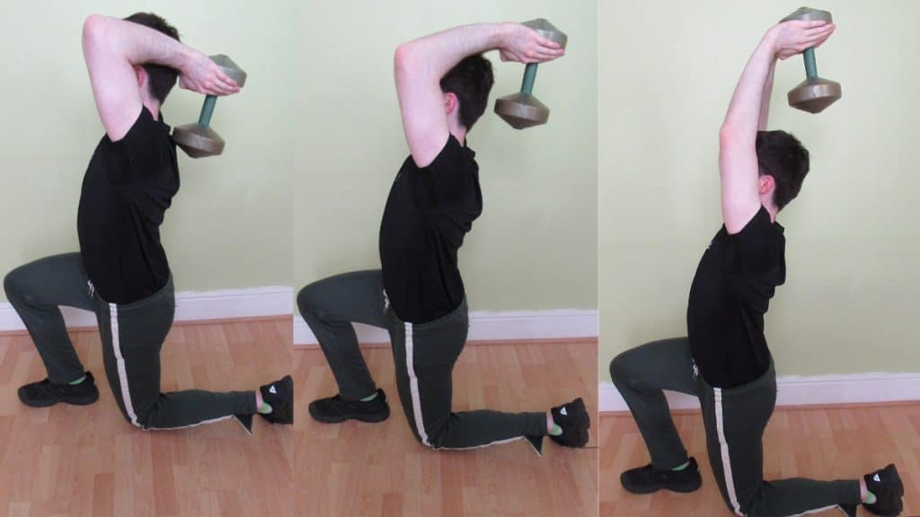 A man doing a static lunge to tricep extension