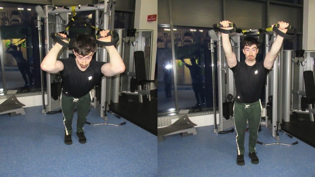 A man doing TRX tricep extensions with a suspension trainer