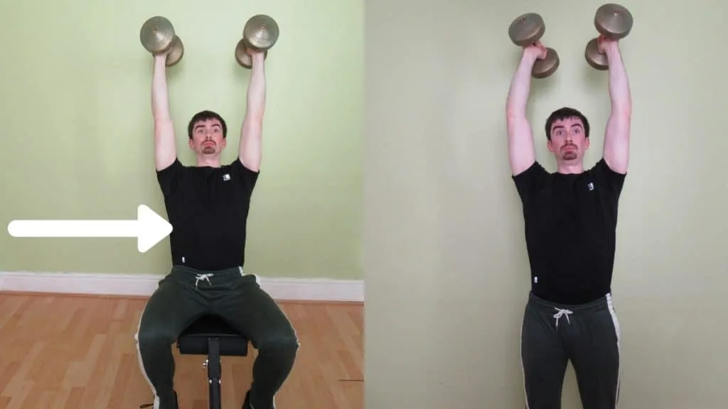 A man doing a two arm seated dumbbell extension