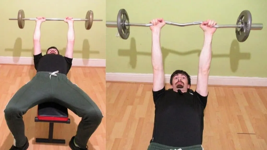 A man demonstrating the difference between a barbell skull crusher and an EZ bar skull crusher