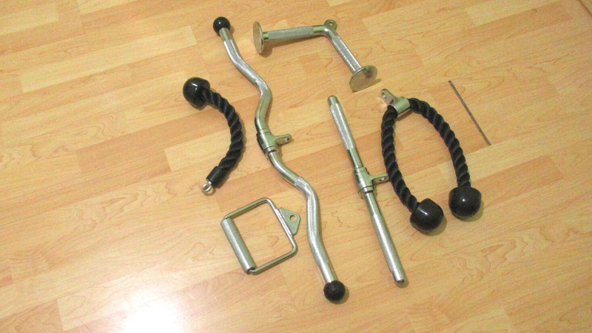 A selection of cable attachments on the floor