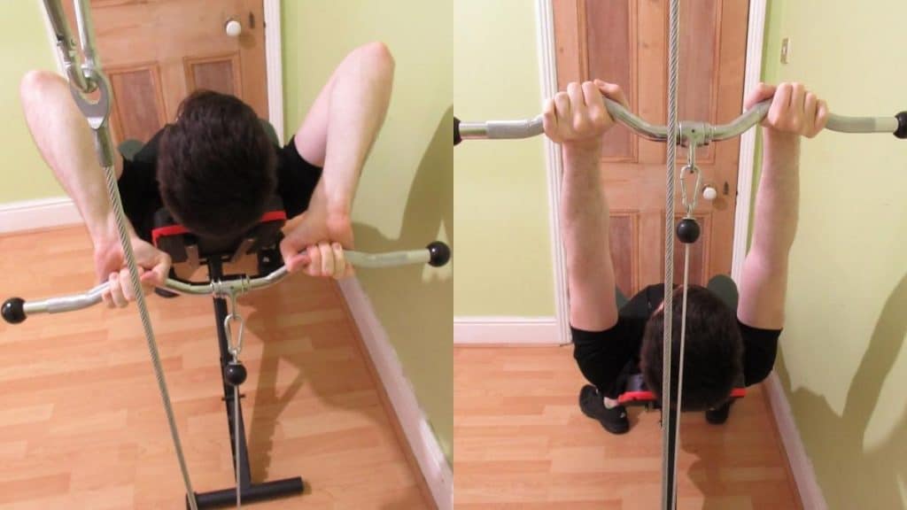 A man doing cable incline tricep extensions