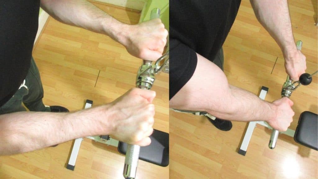 A man doing close grip straight bar pushdowns for his triceps