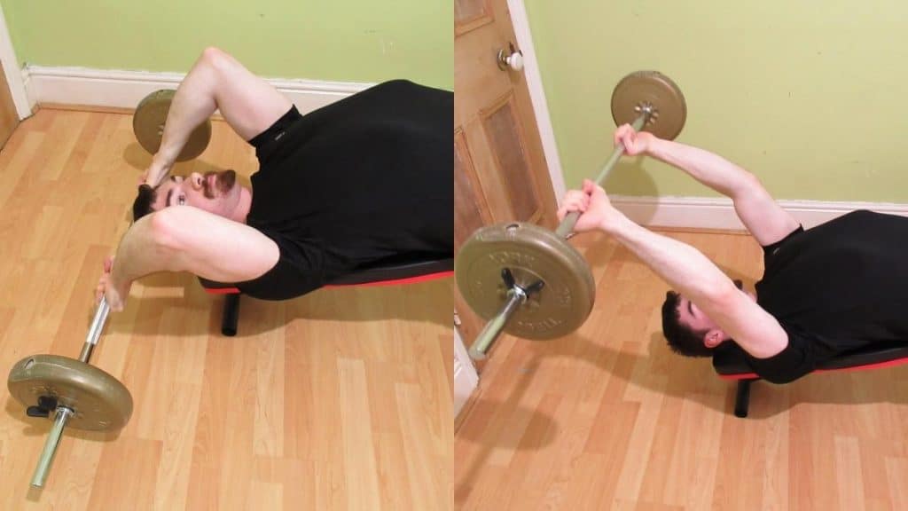 A man doing a decline barbell extension for his triceps