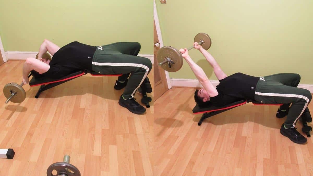 A man doing a decline barbell triceps extension