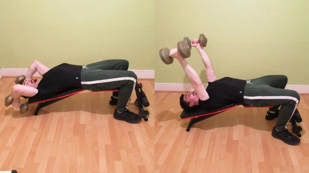 A man doing a decline dumbbell triceps extension