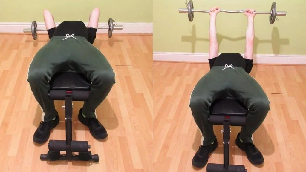 A man performing a decline EZ triceps extension