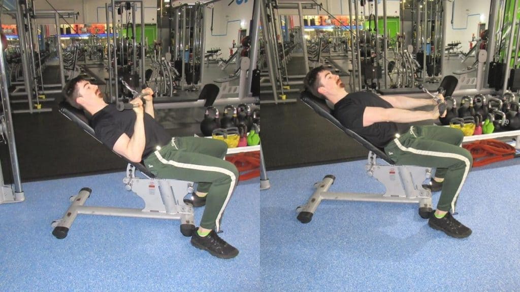A man performing incline bench pressdowns for his triceps