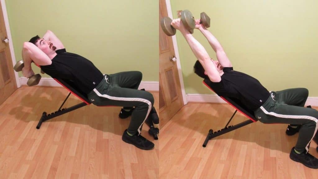 A man performing an incline dumbbell skull crusher