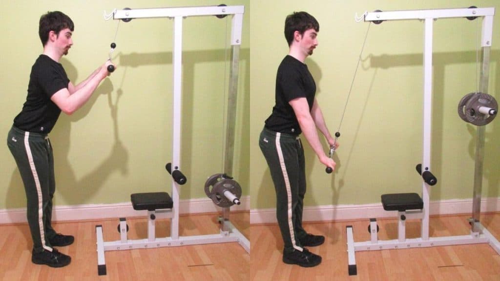 A man doing an iso cable pressdown for his triceps