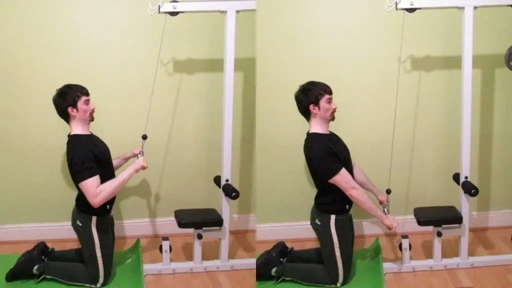 A man doing a kneeling pushdown with a bar