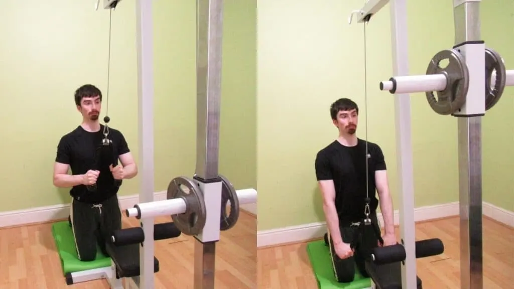 A man doing kneeling rope pushdowns