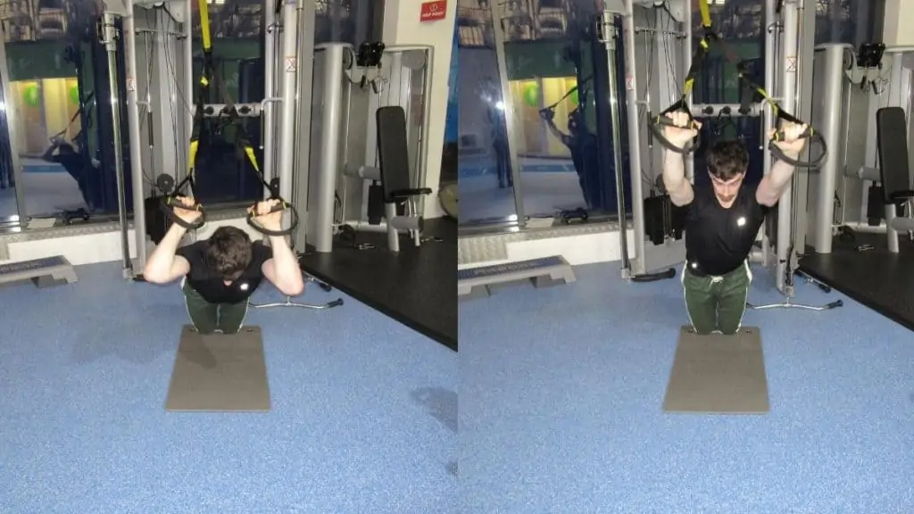 A man doing a kneeling TRX skull crusher