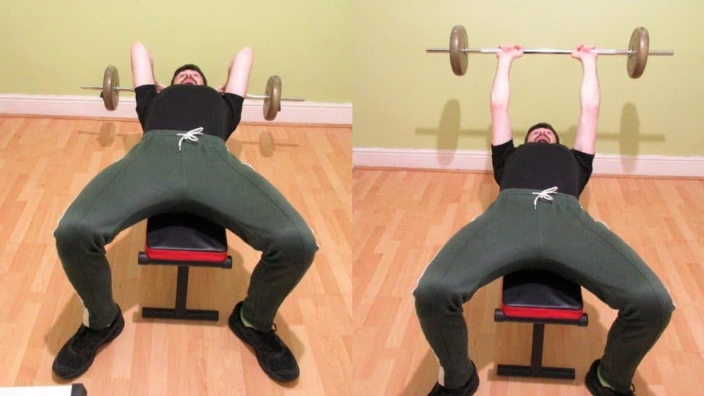 A man doing a lying barbell tricep extension