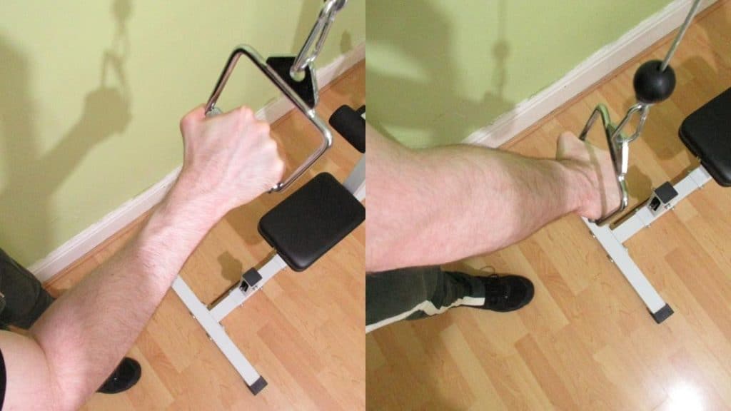 A man performing a one arm cable extension to work his triceps