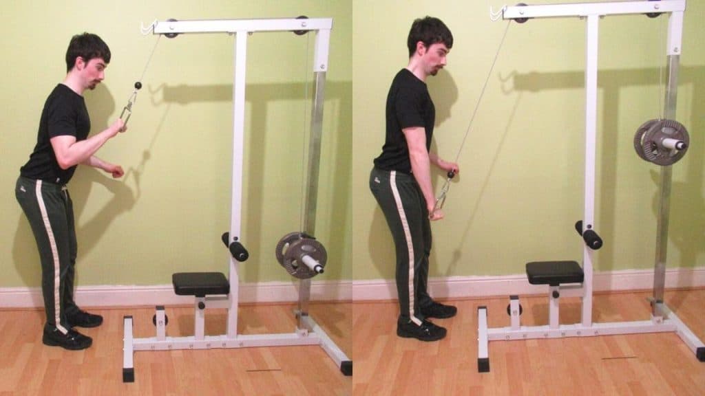 A man performing a one arm isometric pushdown for his triceps