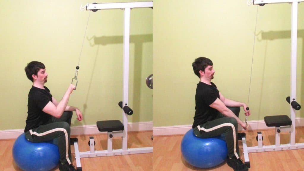 A man doing a one arm stability ball tricep pushdown