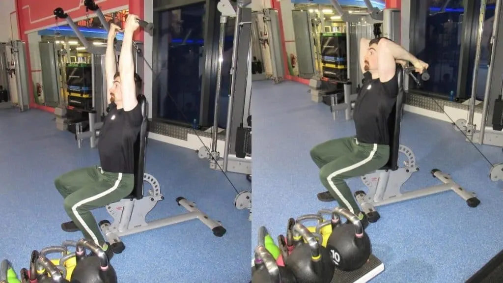 A man at the gym performing reverse seated overhead cable triceps extensions