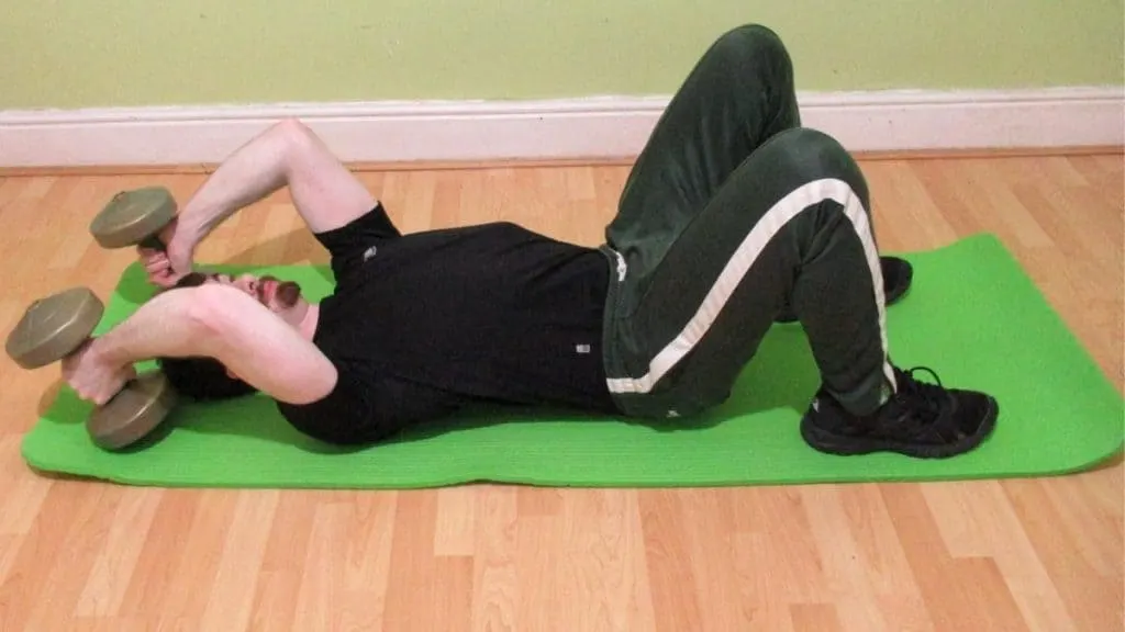 A man performing a good rope pushdown alternative